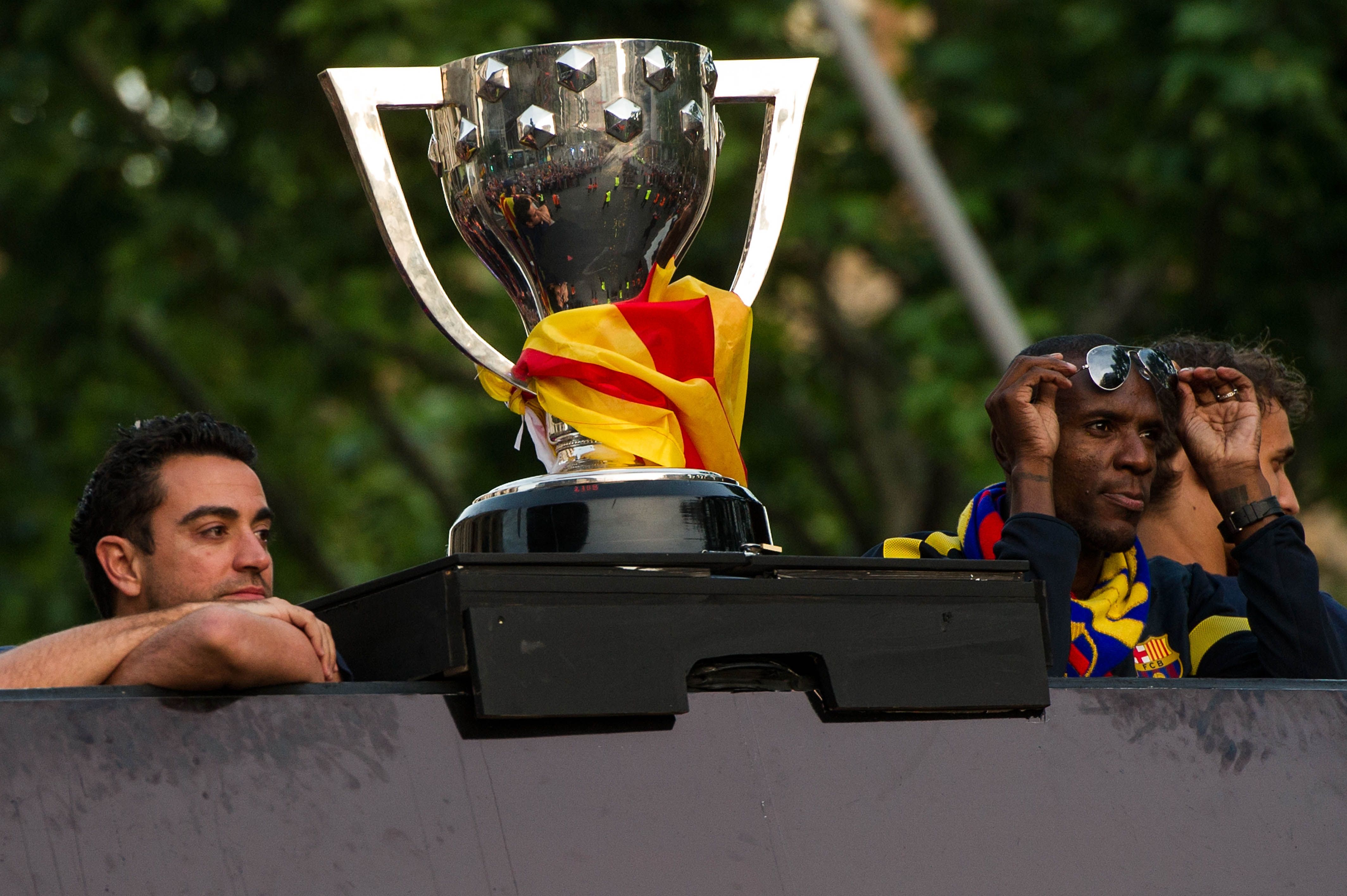 Xavi e Abidal nos tempos de Barcelona