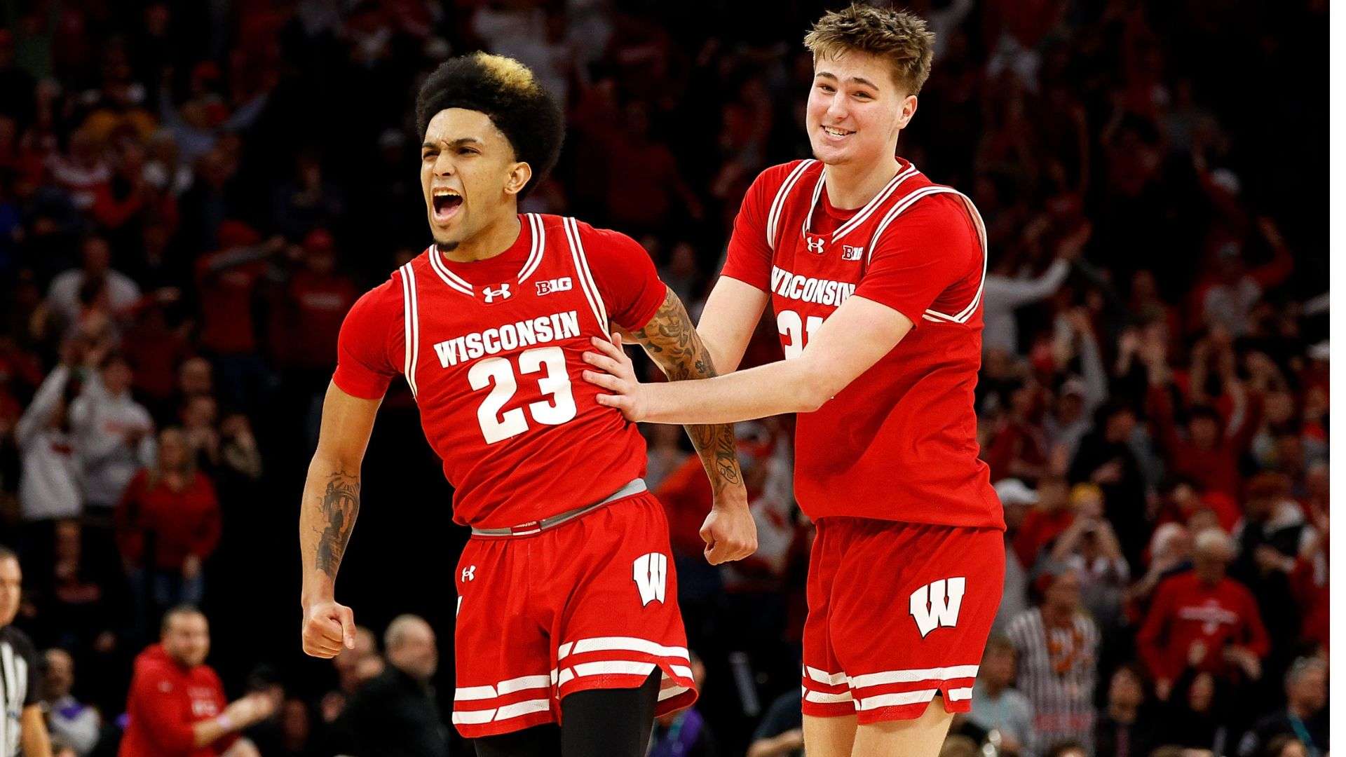 NCAA March Madness Nolan Winter #31 and Chucky Hepburn #23 of the Wisconsin Badgers