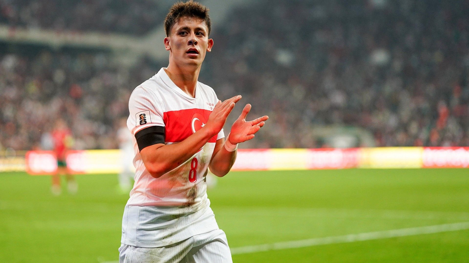 Arda Guler of Turkiye applauds the team fans