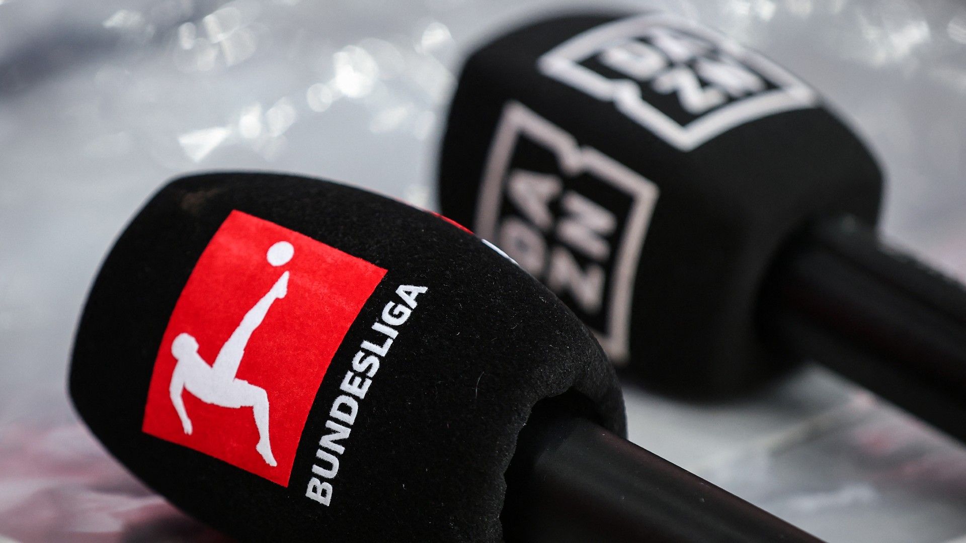 Microphones with the logos of to the British sports streaming and entertainment platform's 