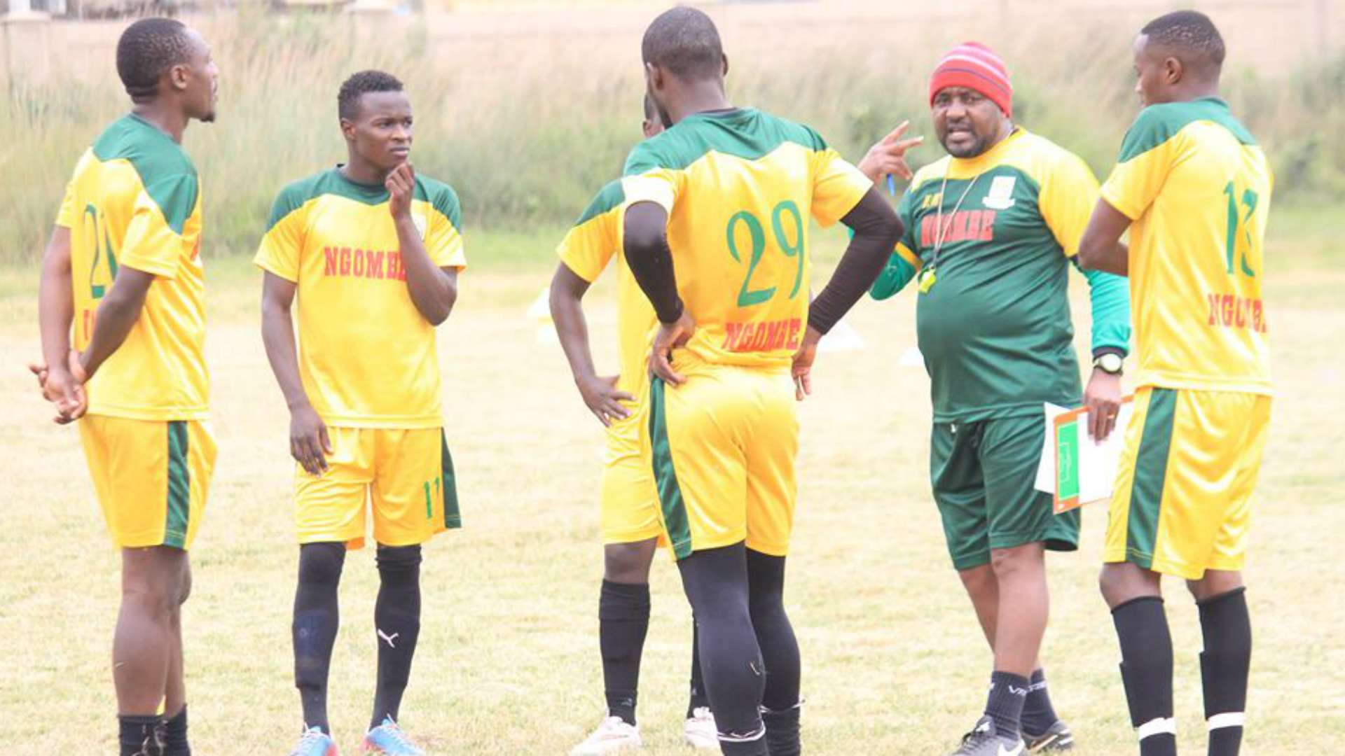 Mathare United coach Francis Kimanzi with players.