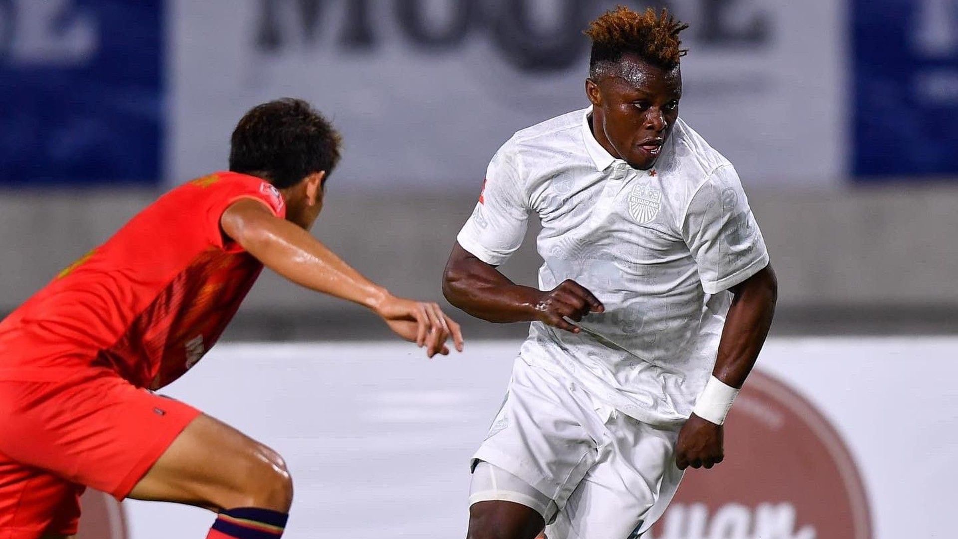 Kenya and Ayub Timbe of Buriram United.