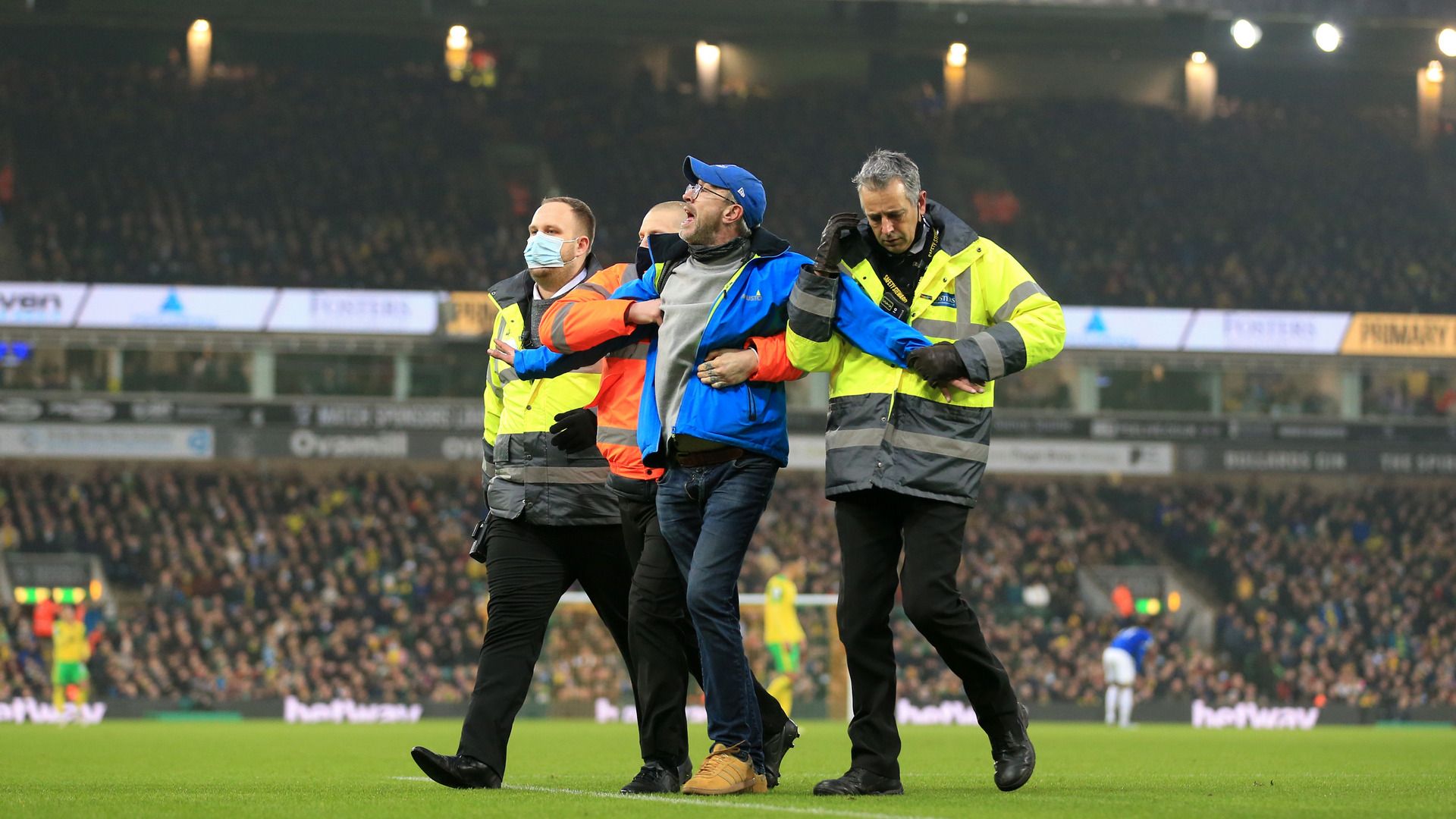 Everton fan invades pitch