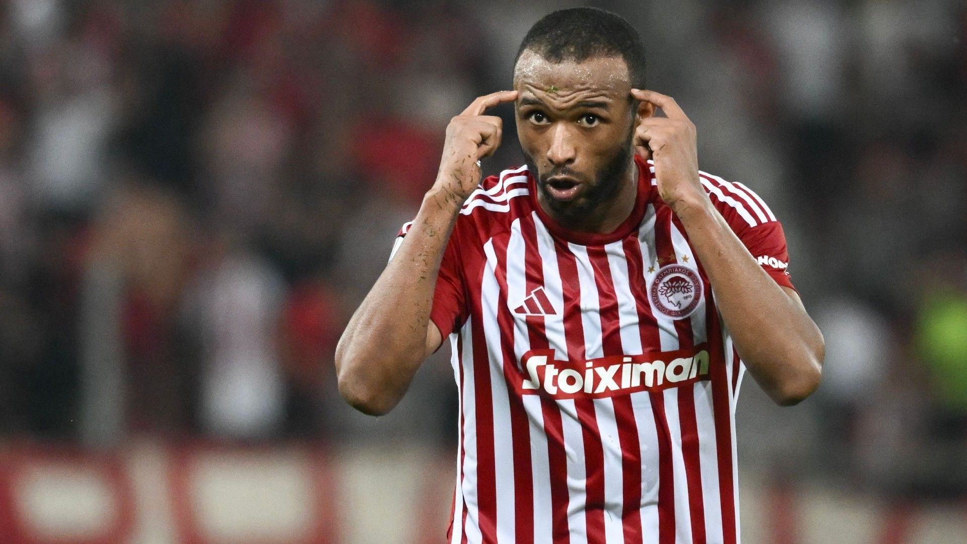 Olympiacos' Moroccan forward #09 Ayoub el-Kaabi celebrates