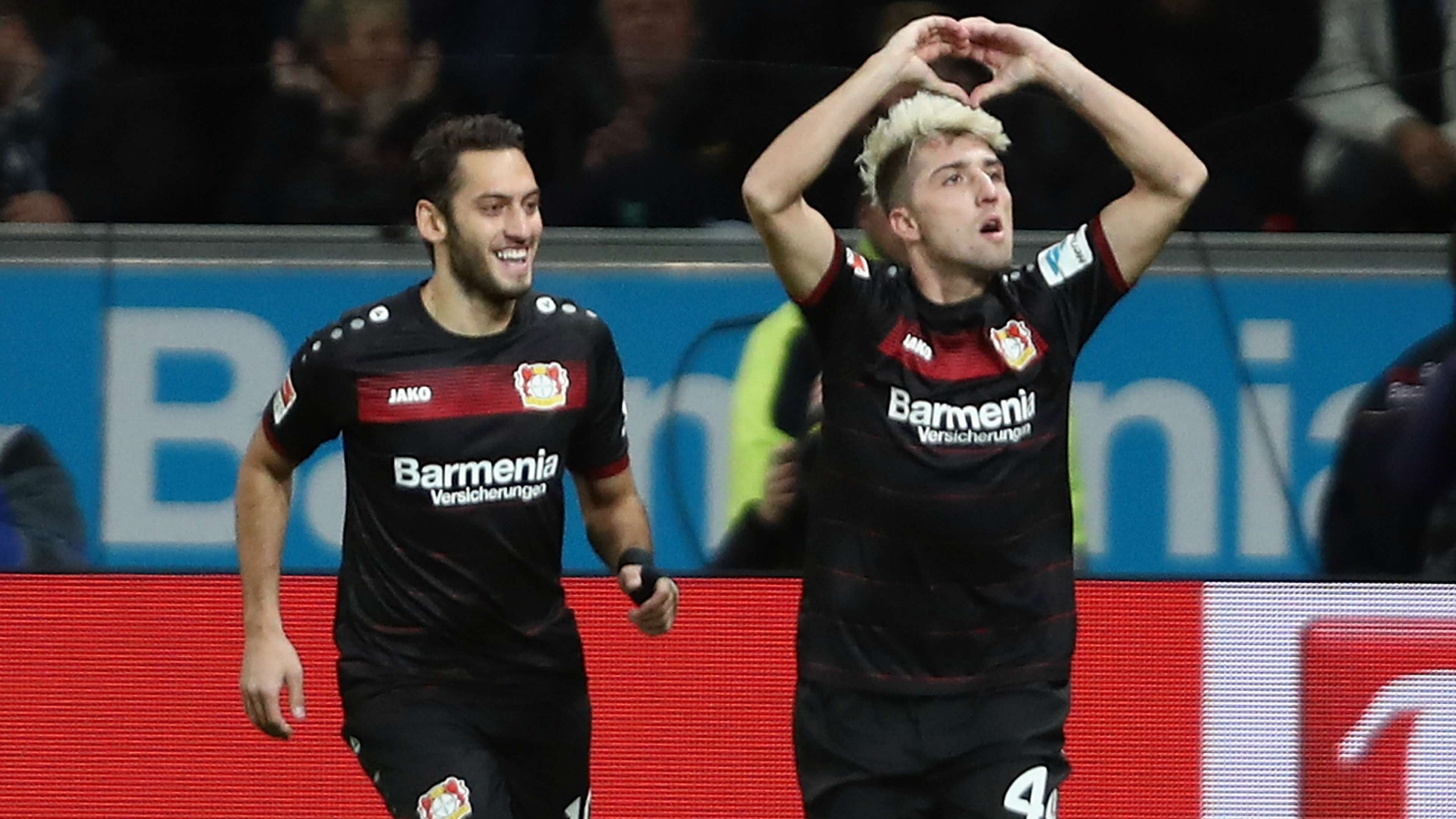Hakan Calhanoglu and Kevin Kampl celebrating Bayer Leverkusen