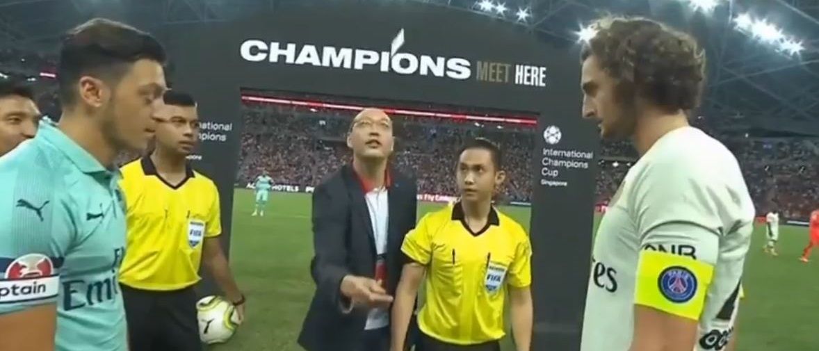 Arsenal PSG Referee credit card toss