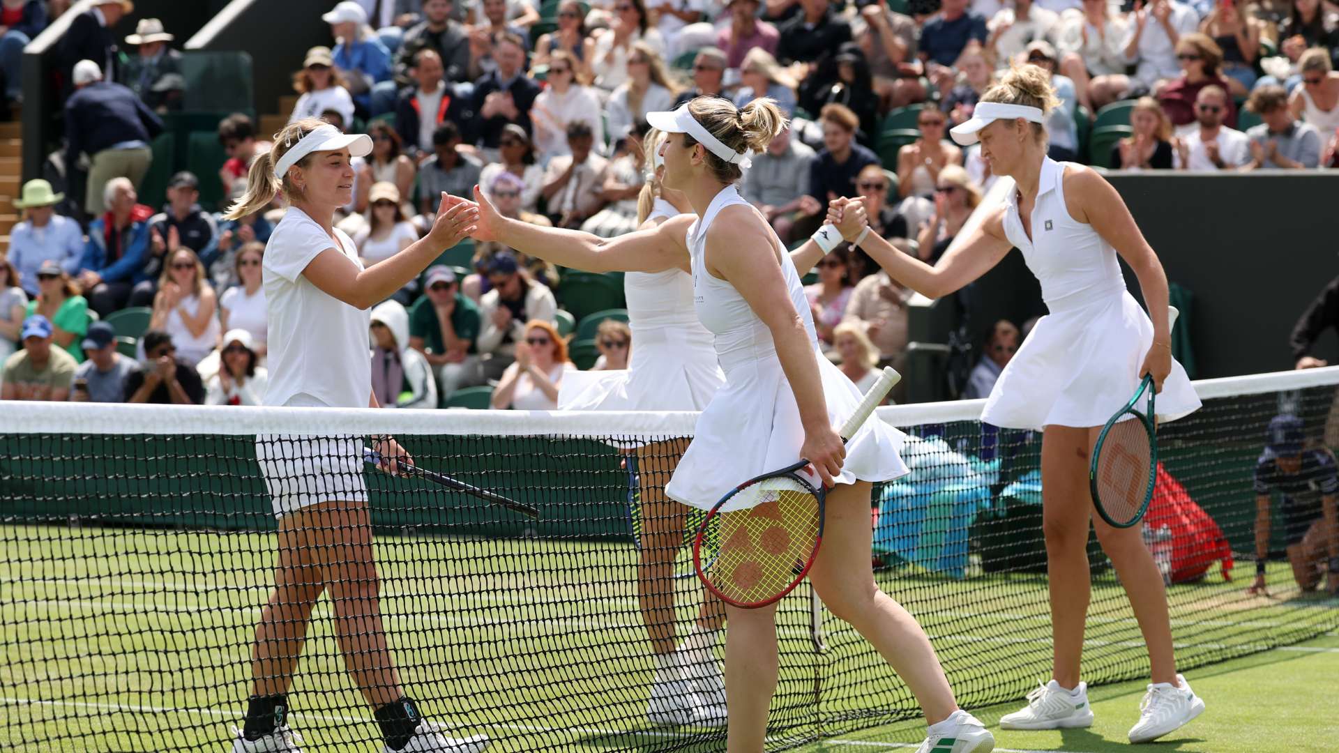 Gabriela Dabrowski of Canada and Erin Routliffe of New Zealand shake hands with Irina Khromacheva and Fanny Stollar of Hungary Wimbledon 2025