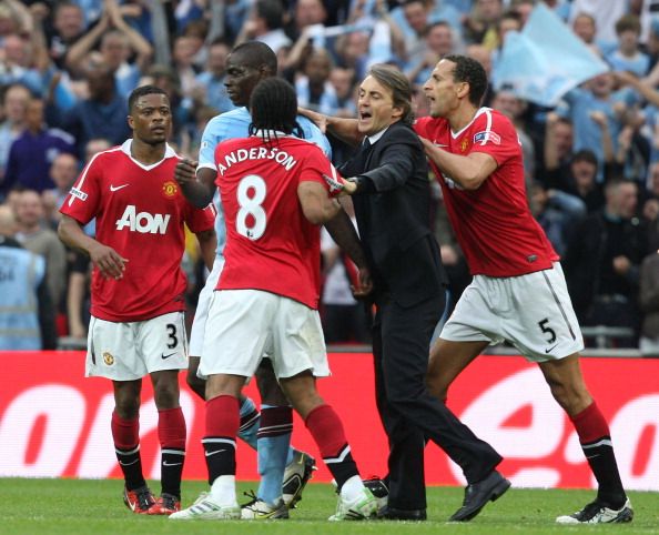 Balotelli_Rio Ferdinand_Anderson_Mancini_20110416