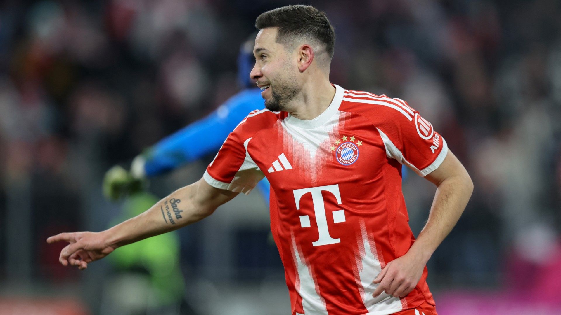 Bayern Munich's Portuguese defender #22 Raphael Guerreiro celebrates