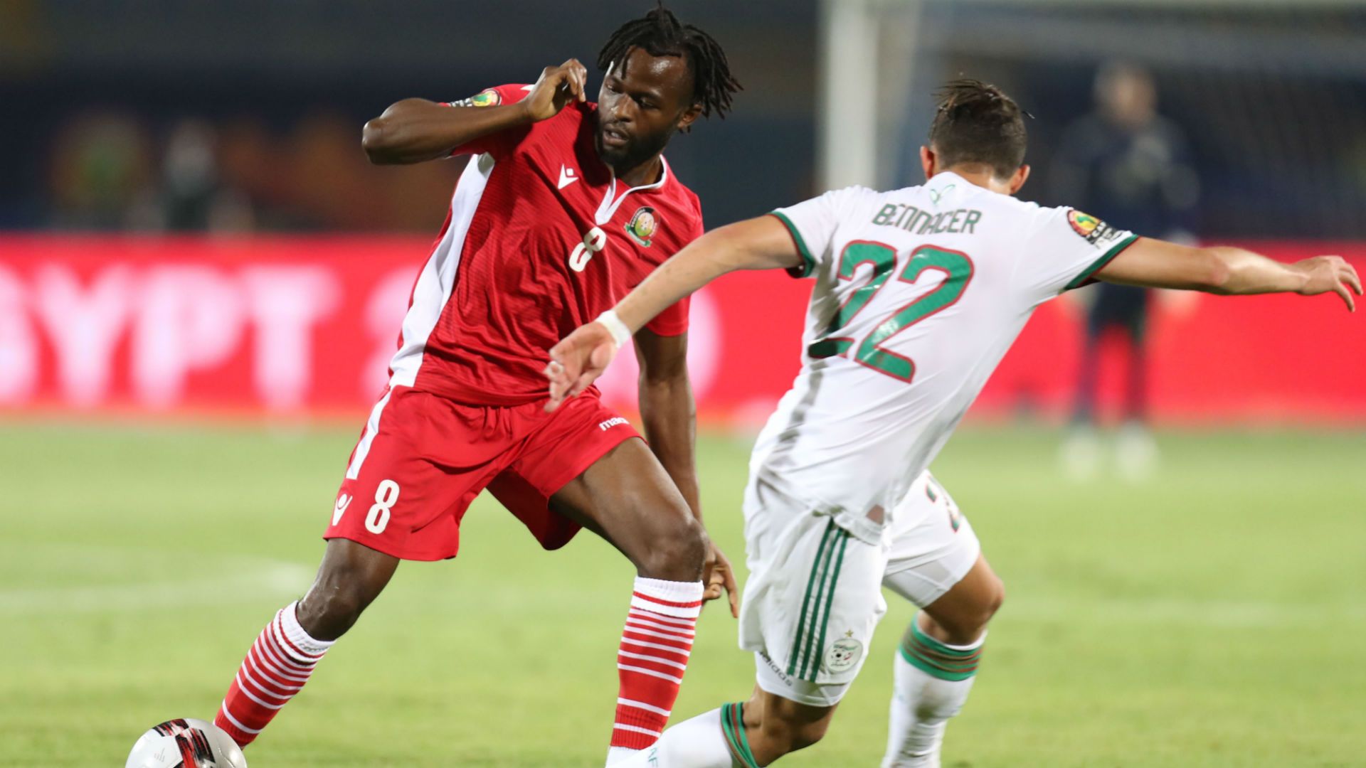 Johanna Omolo of Kenya challenged by Ismael Bennacer of Algeria.
