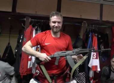 Ice Hockey player recieves an AK-47
