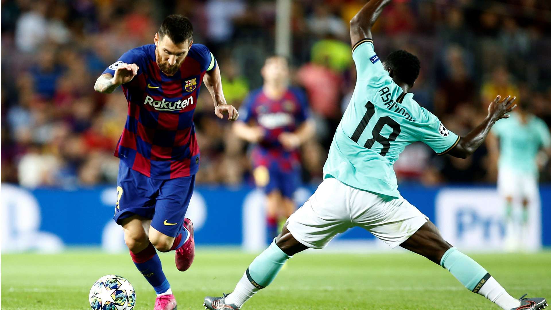 Lionel Messi and Kwadwo Asamoah - Barcelona v Inter Milan