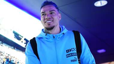 Ederson Manchester City blue hair