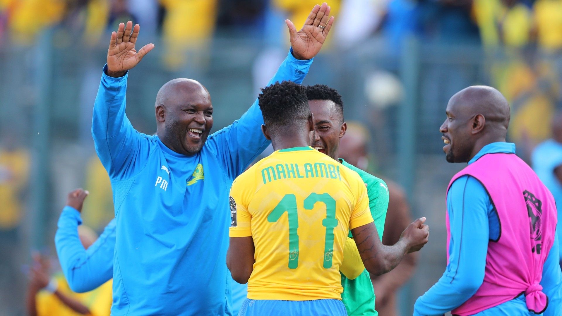 Pitso Mosimane celebrates with Mamelodi Sundowns players in April 2019