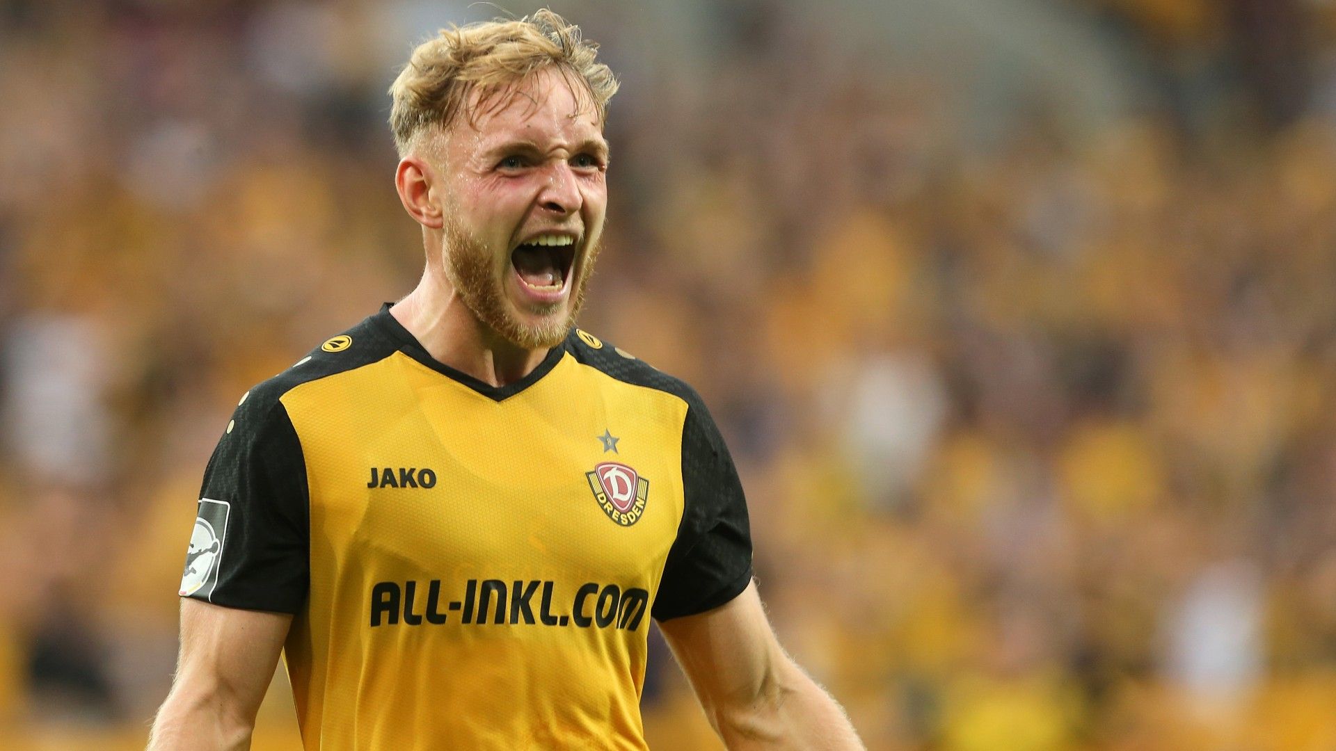 Tony Menzel of Dresden reacts 