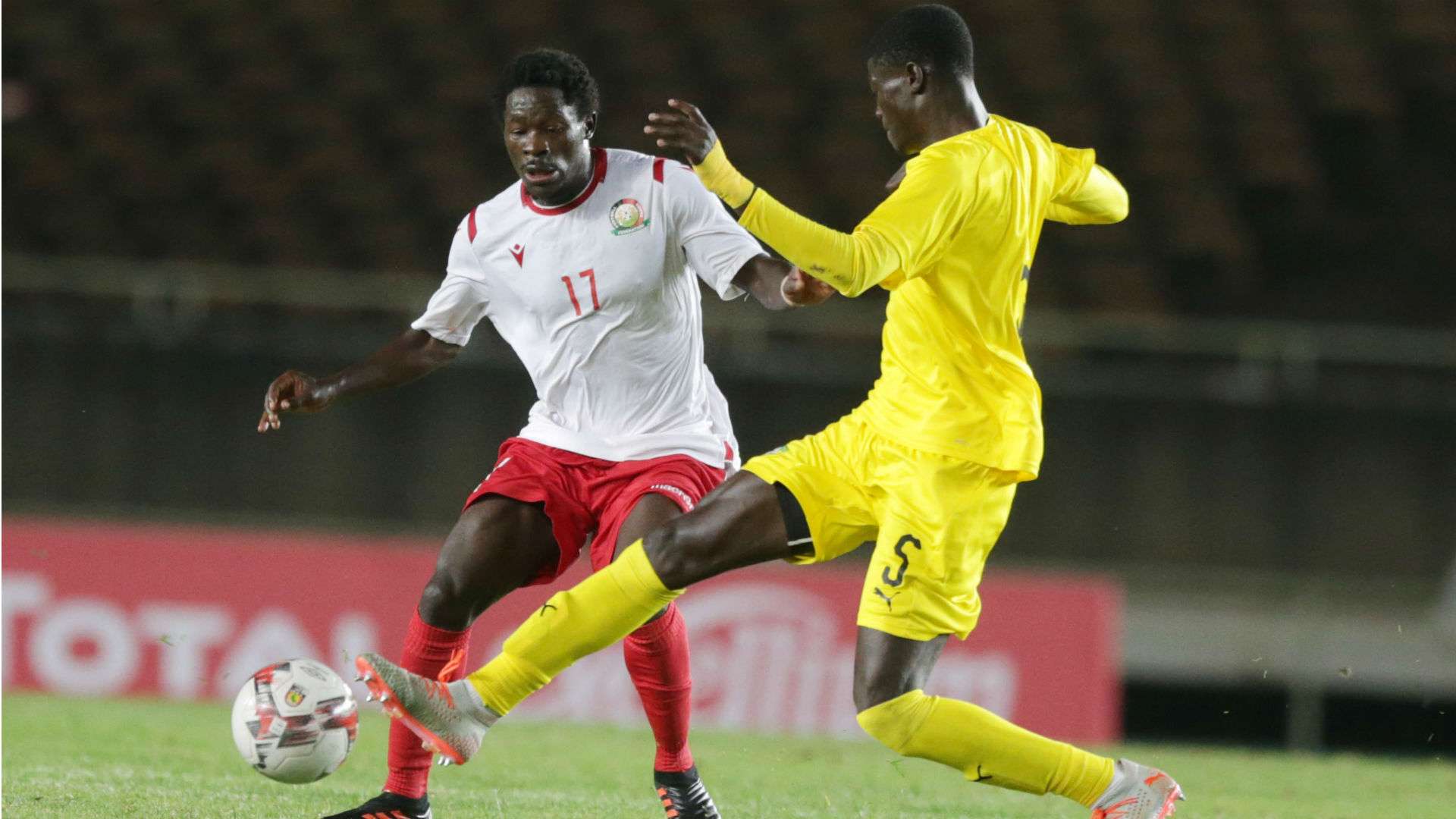 Lawrence Juma of Kenya and Harambee Stars vs Hakim Ouro of Togo.
