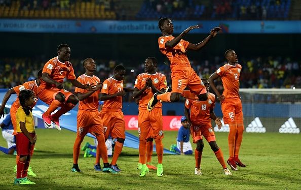 Niger players celebrate