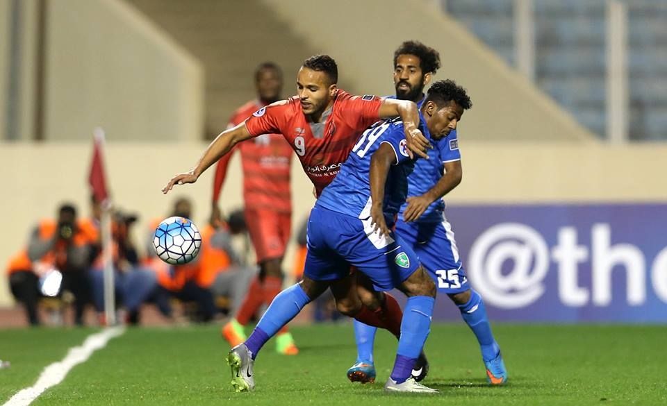 Lekhwiya's EL Arabi fighting for the ball