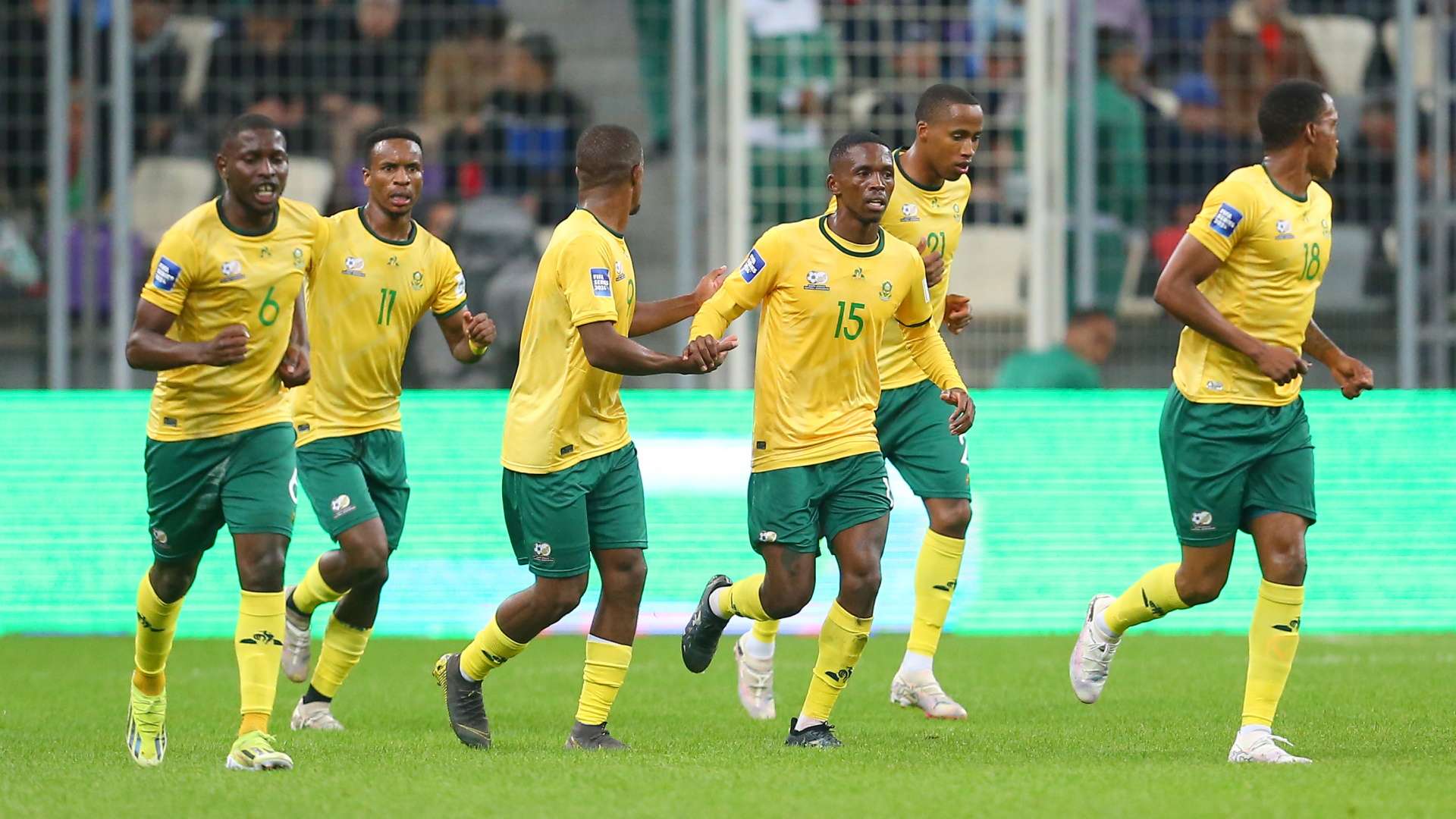 Themba Zwane and Bafana Bafana players celebrating vs Algeria, March 2024