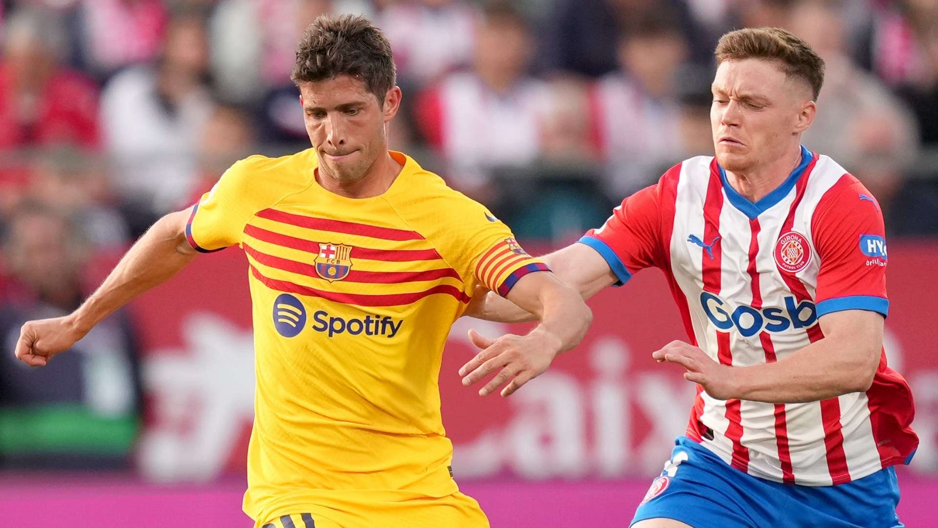 Sergi Roberto battles to win possession for Barcelona