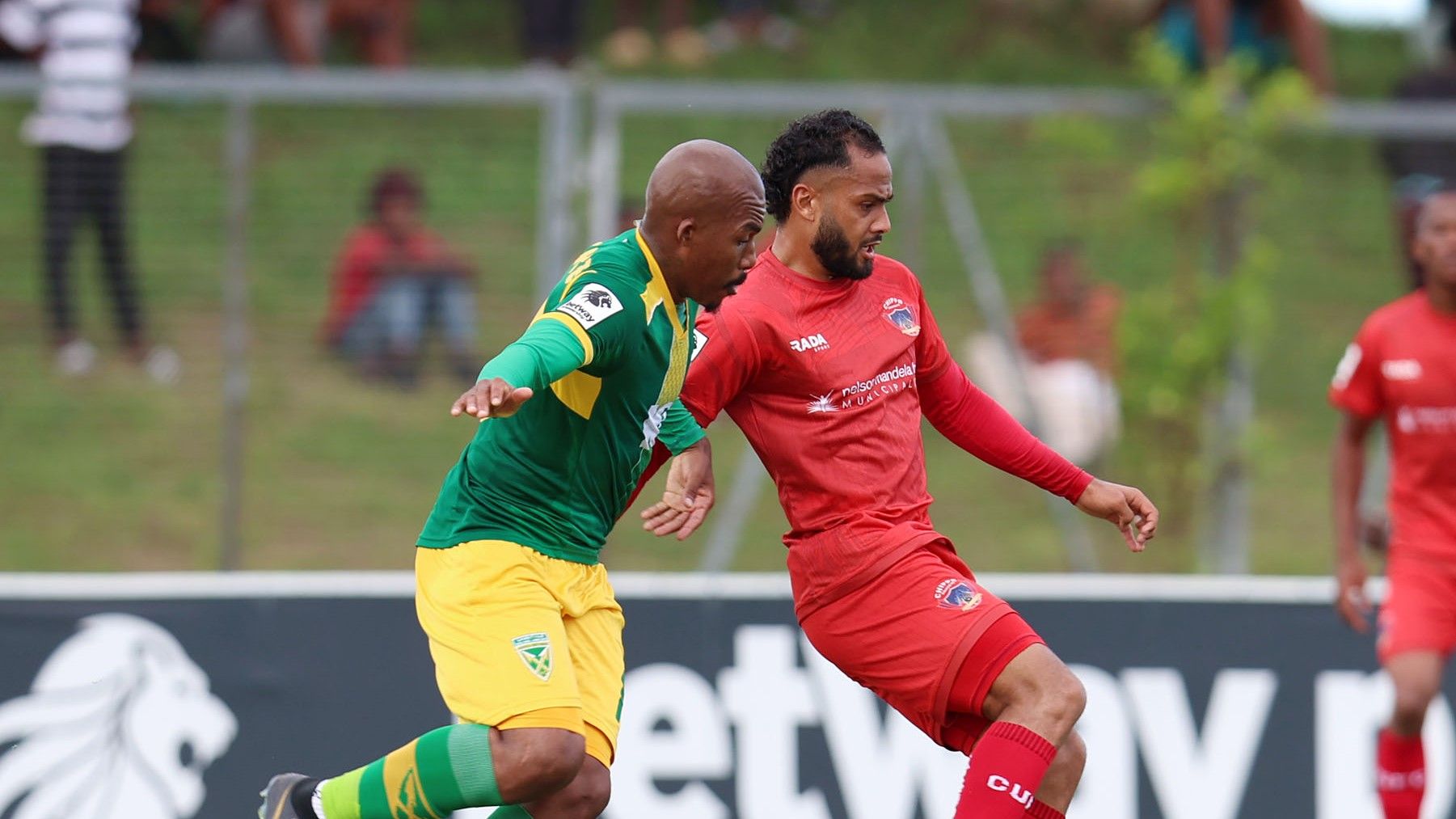 Sirgio Kammies of Chippa United challenges Thabani Zuke of Golden Arrows