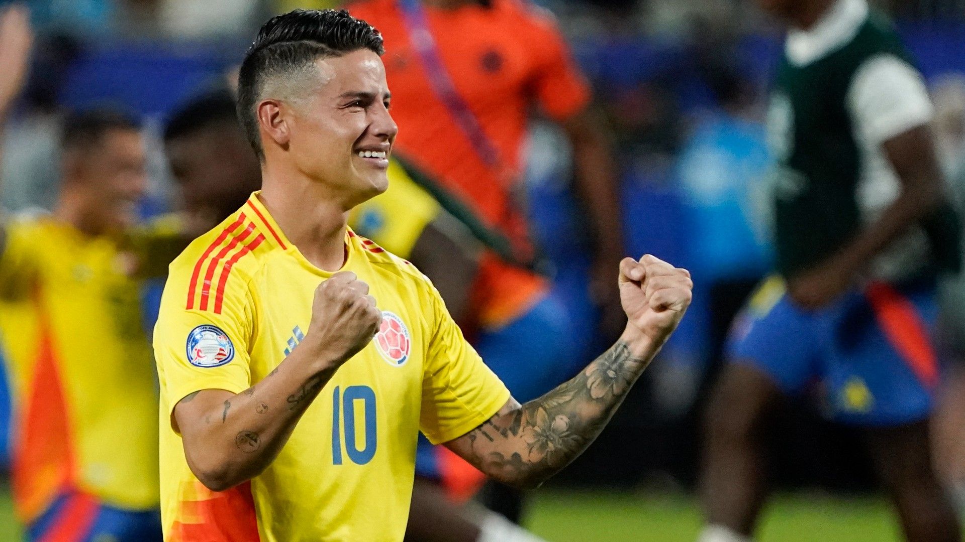 Colombia's midfielder #10 James Rodriguez celebrates