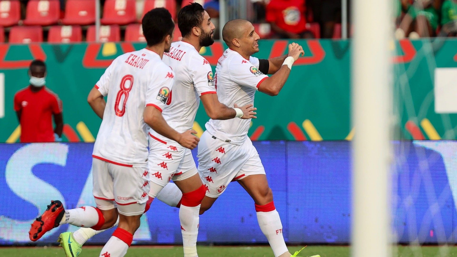 Tunisia captain Wahbi Khazri celebrates his goal with teammates during the 2021 Africa Cup of Nations.