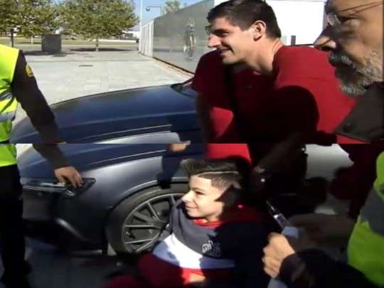 1일(현지시간) 훈련장 앞에서 팬들과 만나 사진 촬영 중인 쿠르투아. 사진='엘 에스파뇰'이 공개한 영상 캡처