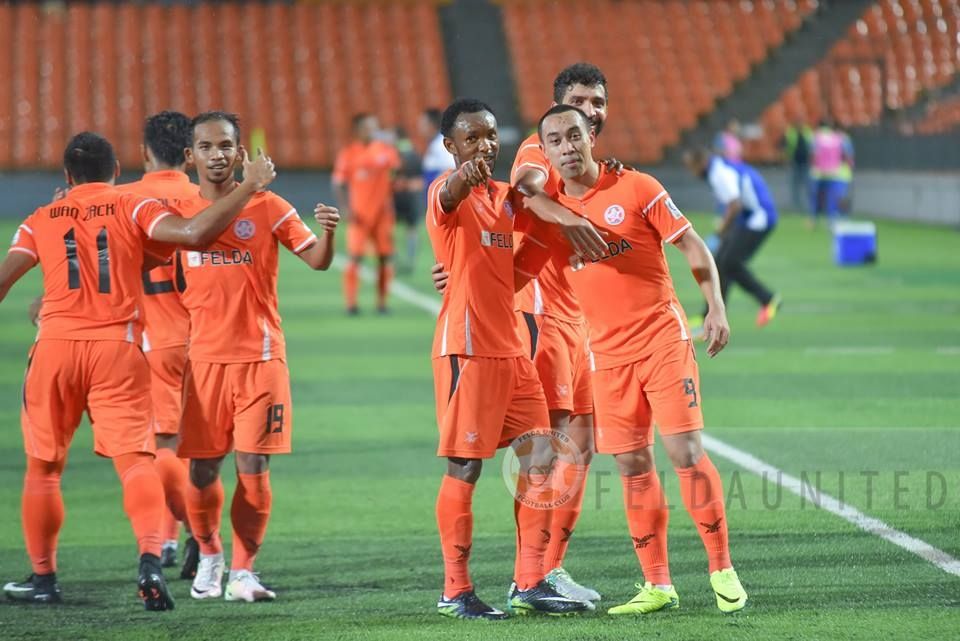 Felda United players celebrating their goal against PKNS 21/1/2017