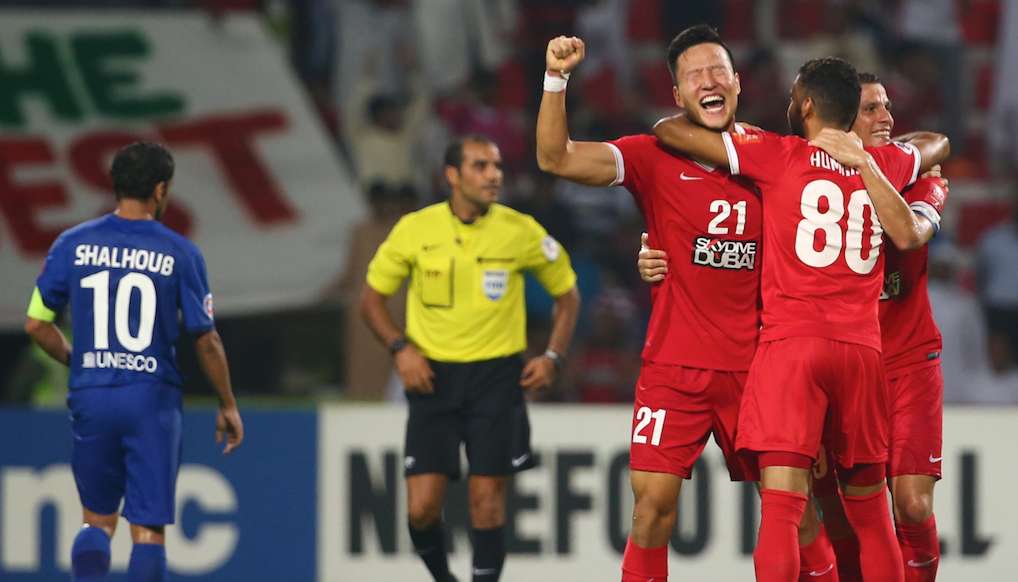 Kwon Kyung-Won (21) of UAE's Al-Ahli celebrates at the end of the AFC Champions League semi final football match against Saudi's Al-Hilal