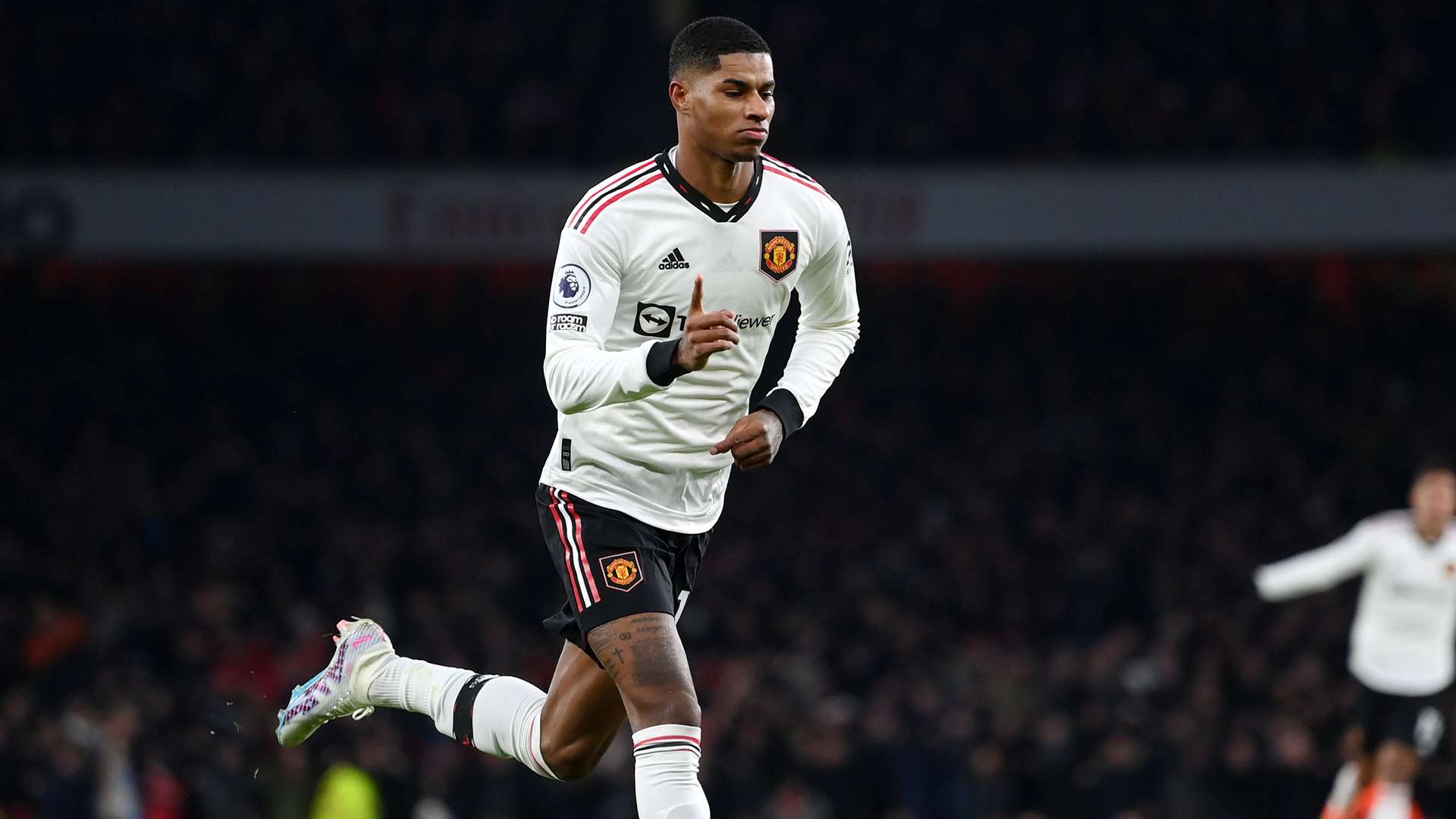 Marcus Rashford celebrates Arsenal Man Utd 2022-23