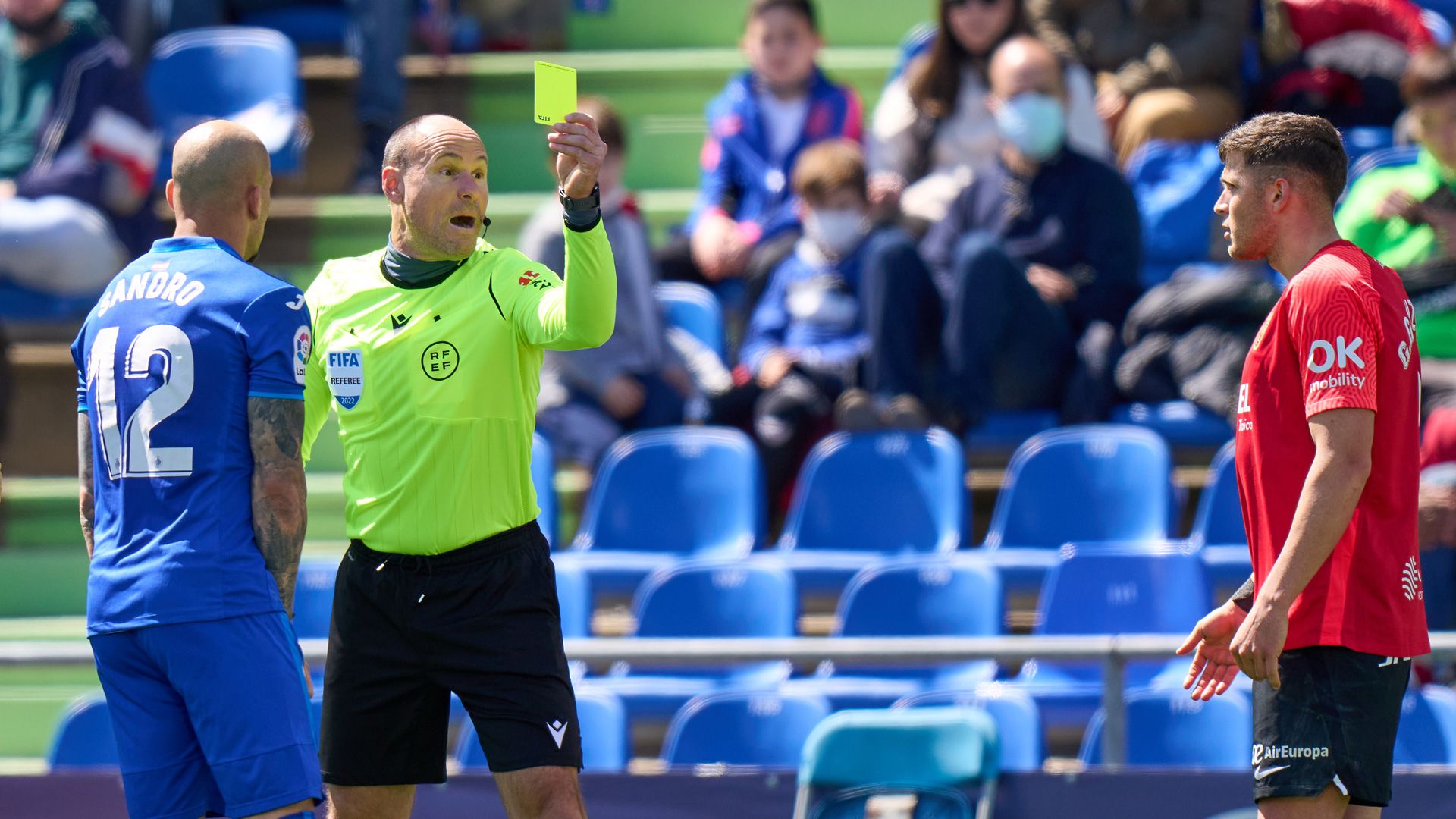 Lahoz referee yellow card