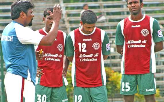 Ashim Biswas (centre)