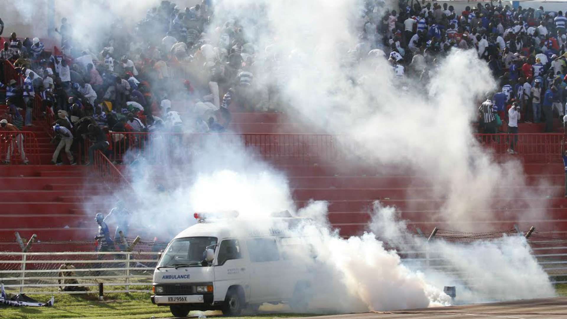 An ambulance is covered with teargas after crowd trouble