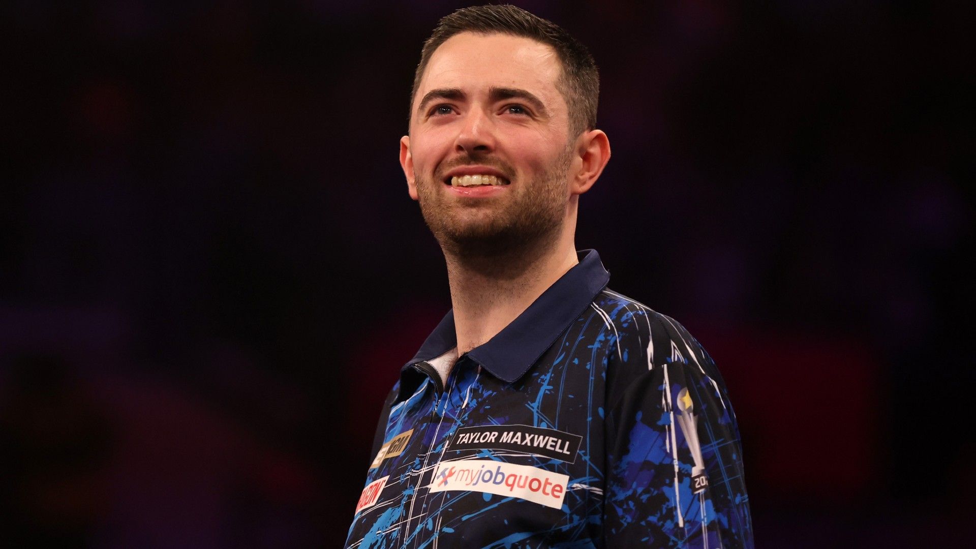  Luke Humphries of England reacts 
