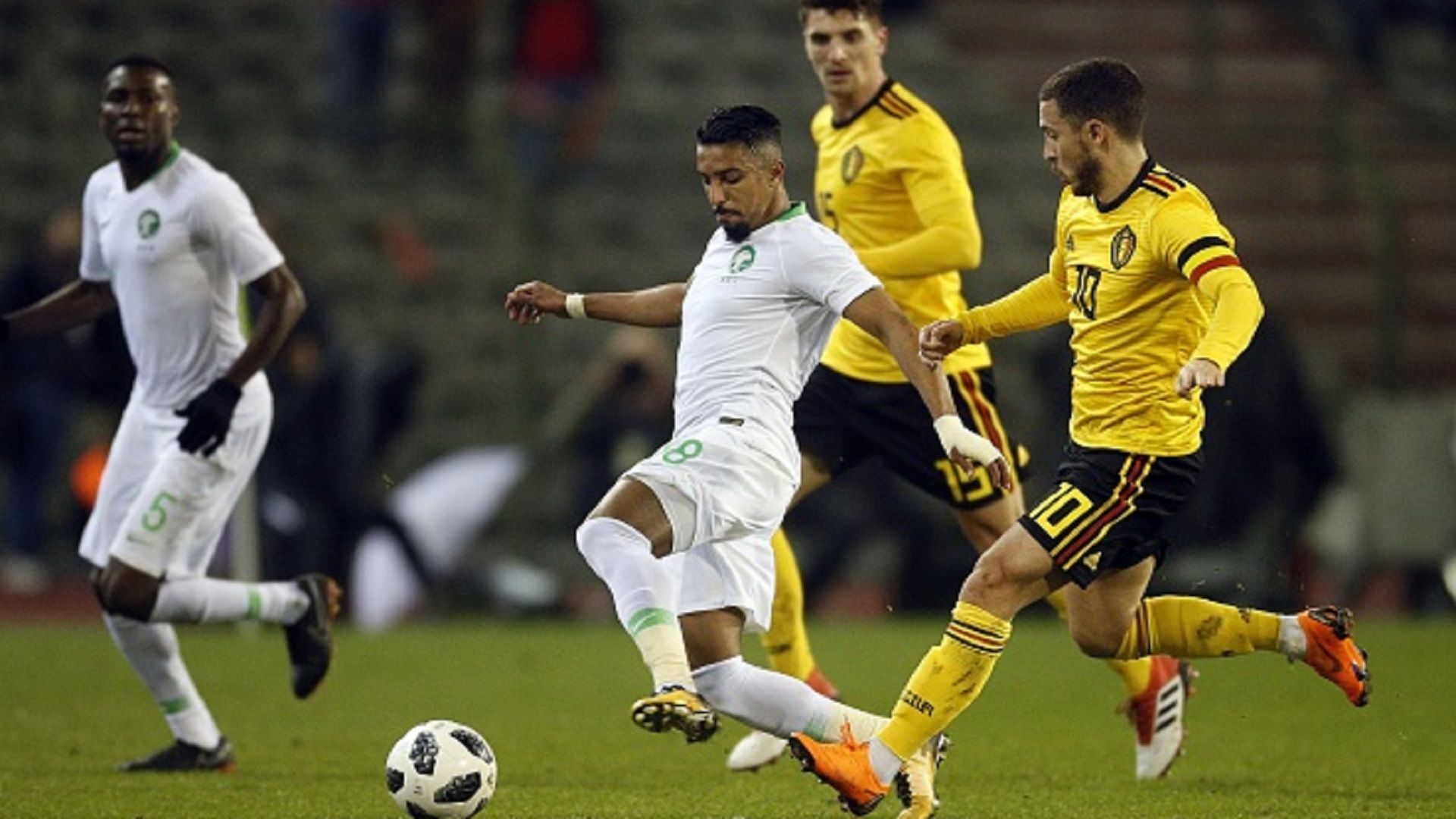 Omar Othman and Salem Aldawsari of Saudi Arabia, Thomas Meunier and Eden Hazard of Belgium friendly match on March 27, 2018 at the Koning Boudewijnstadion Stadium in Brussels, Belgium