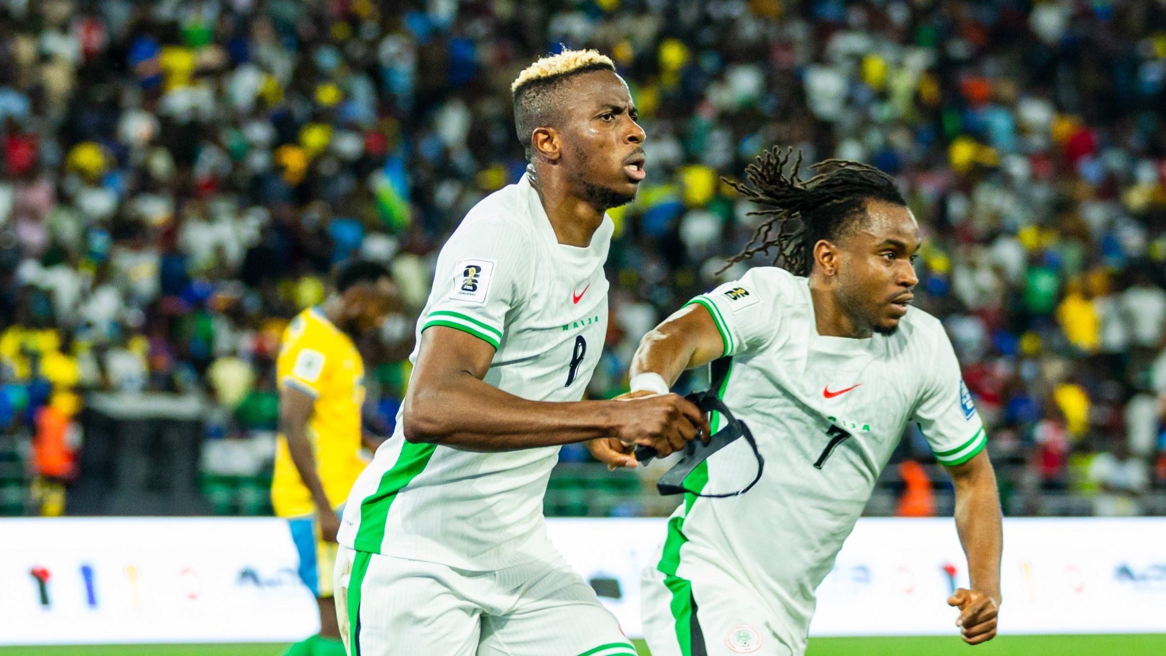 Victor Osimhen and Ademola Lookman celebrate a goal for the Super Eagles