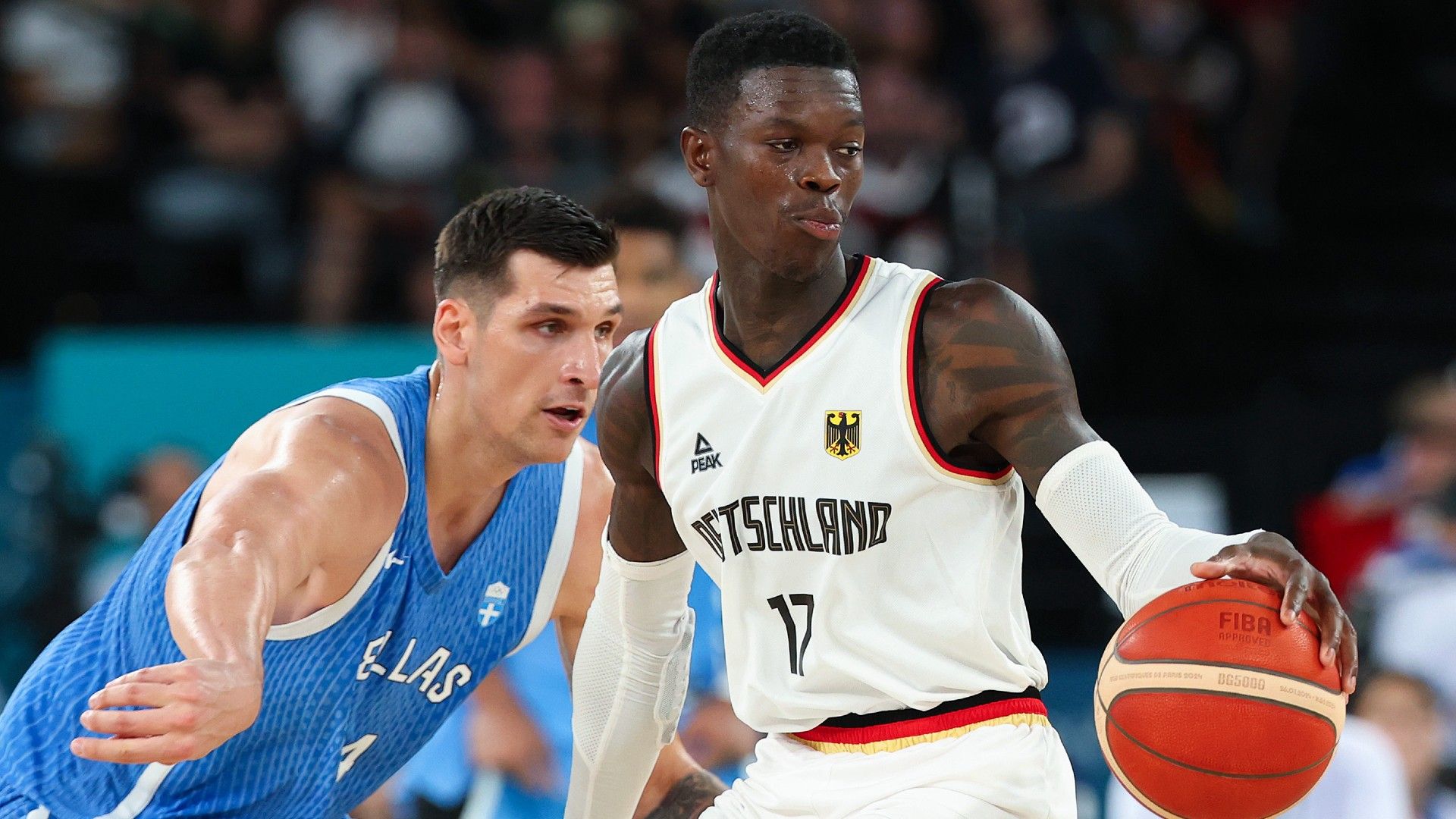  Dennis Schroder #17 of Team Germany handles the ball against Panagiotis Kalaitzakis #11 of Team Greece