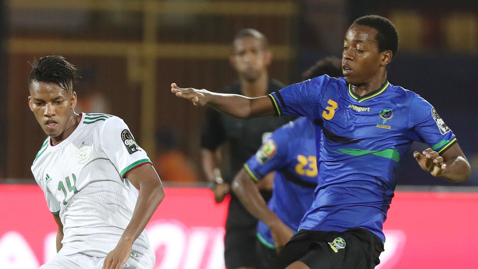 Hicham Boudaoui of Algeria challenged by Feisal Salum of Tanzania.