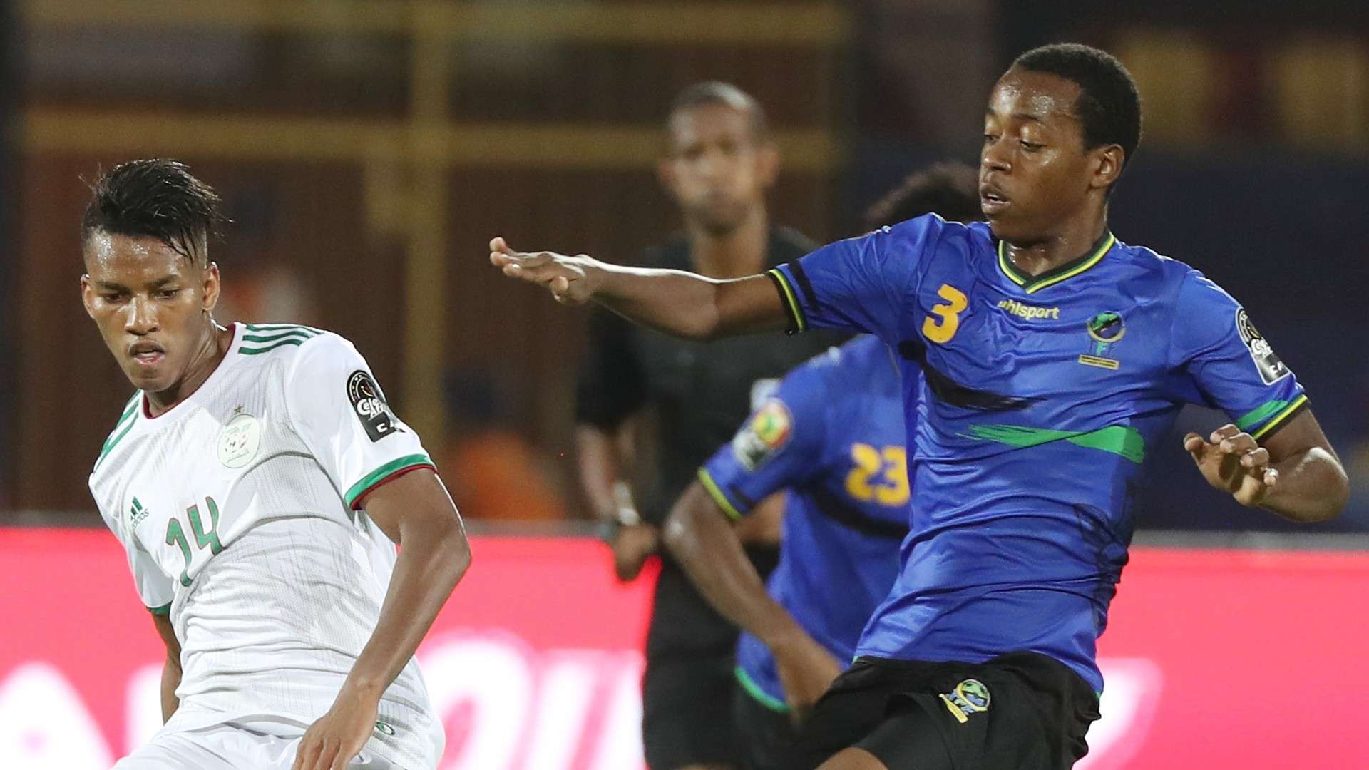 Hicham Boudaoui of Algeria challenged by Feisal Salum of Tanzania.