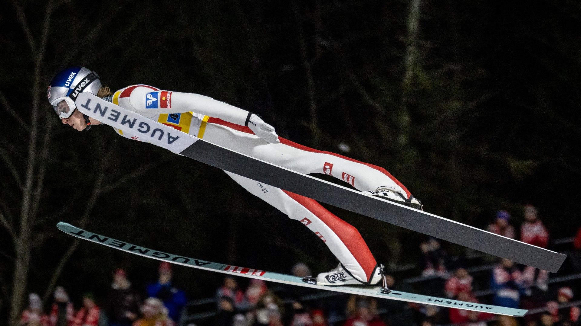 Daniel Tschofenig of Austria soars through the air 
