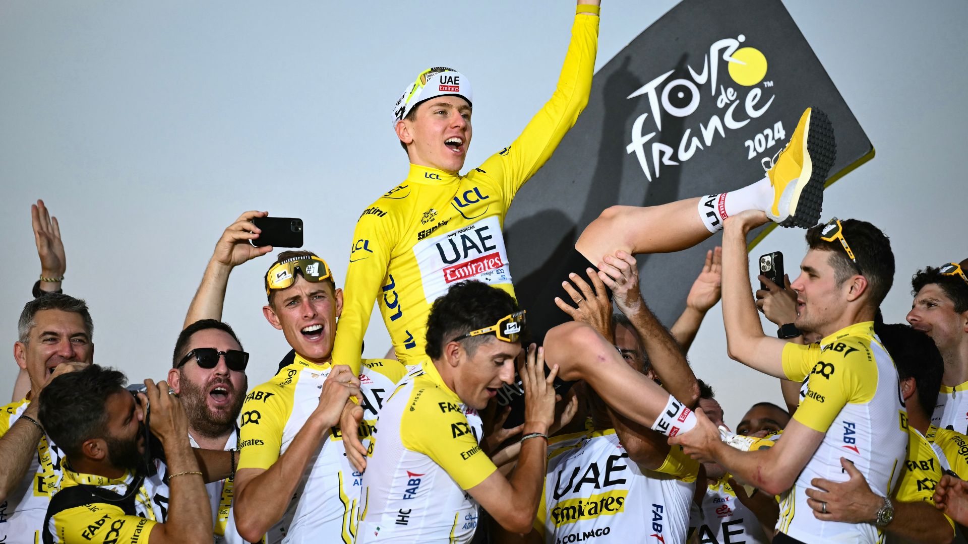 Slovenian rider Tadej Pogacar celebrates Tour de France 2024 win