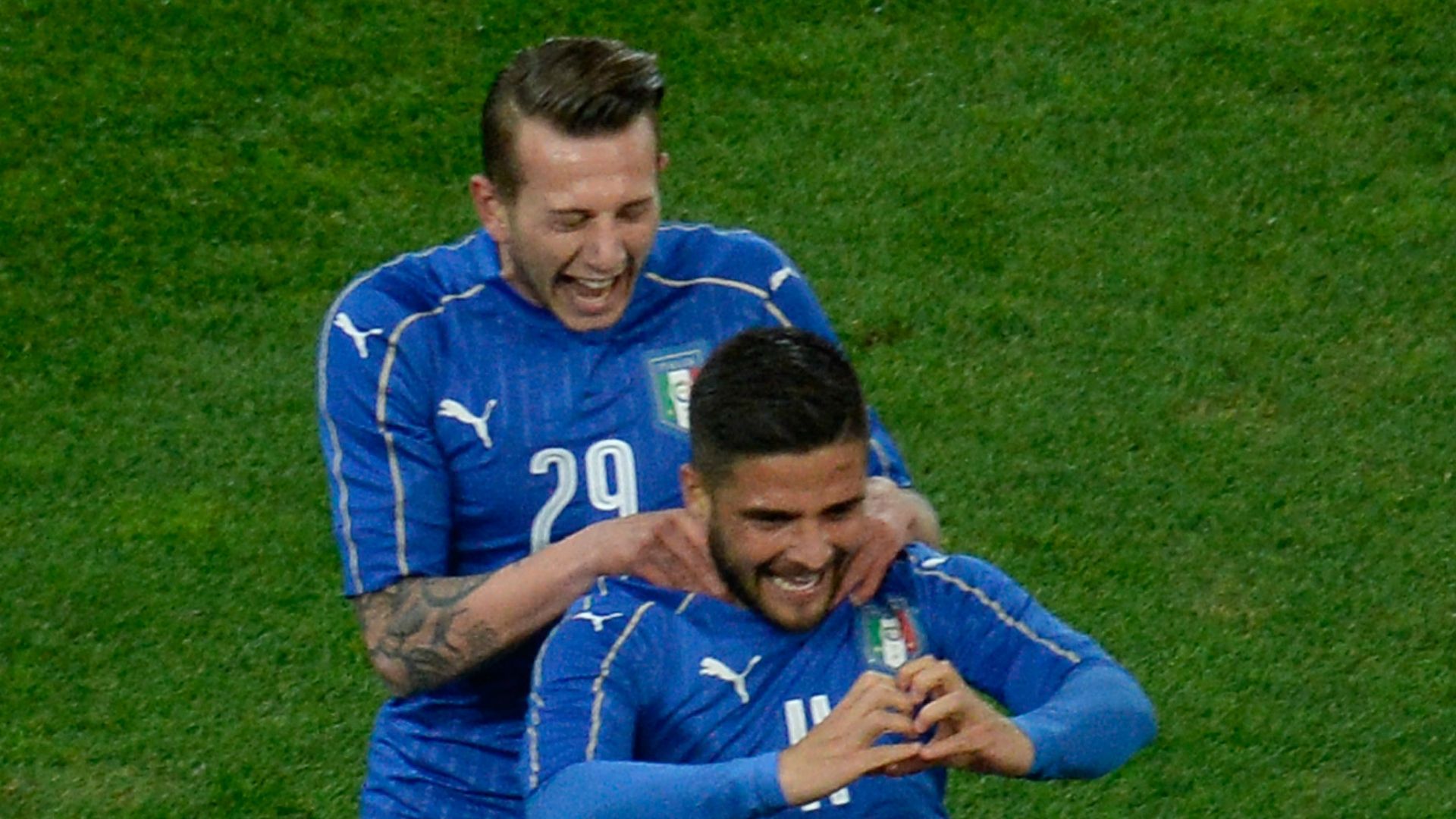 Lorenzo Insigne celebrates with Bernardeschi Italy Spain friendly 24032016