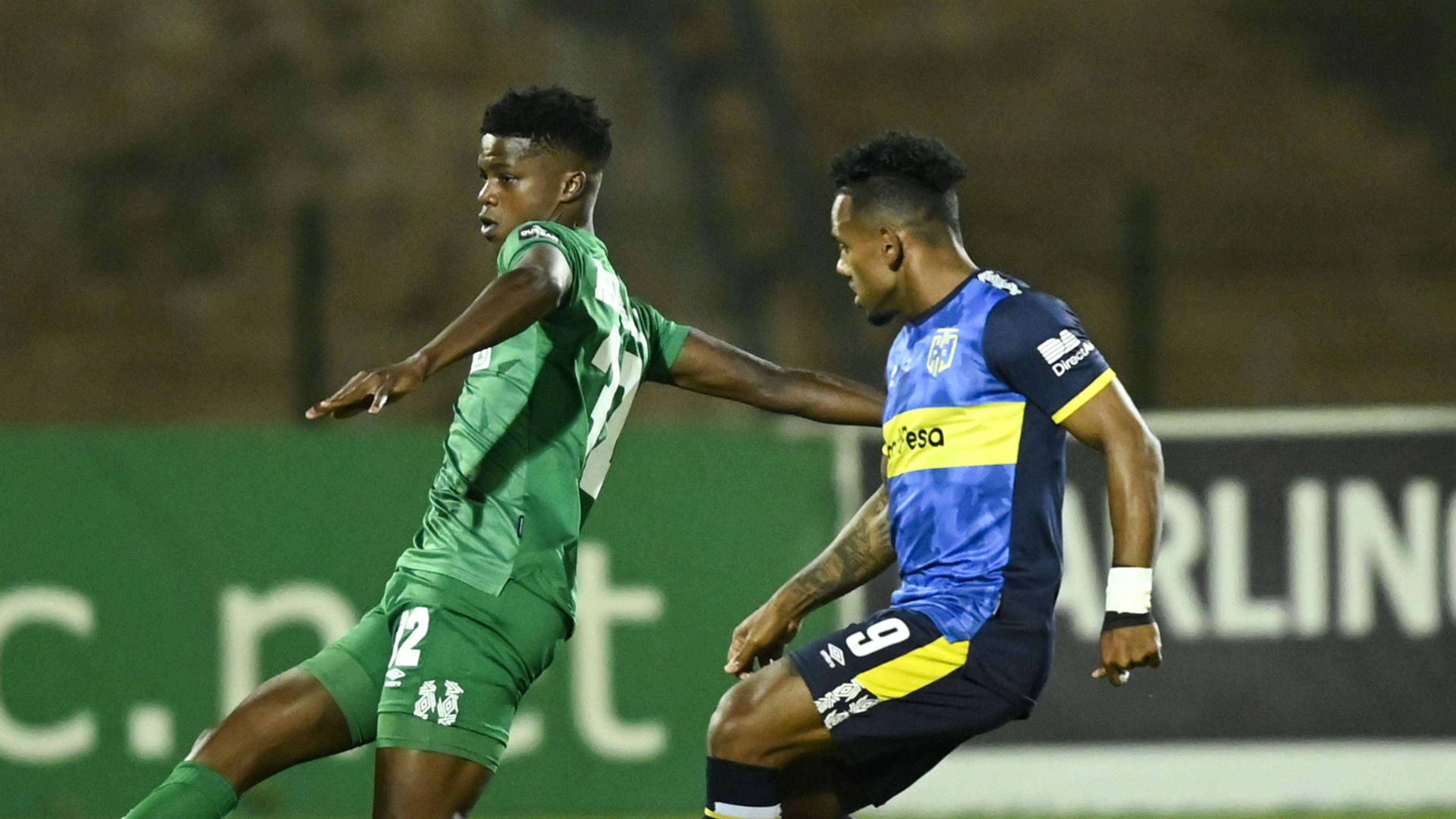 Sandile Khumalo of AmaZulu FC is challenged by Kermit Erasmus of Cape Town City FC, October 2019