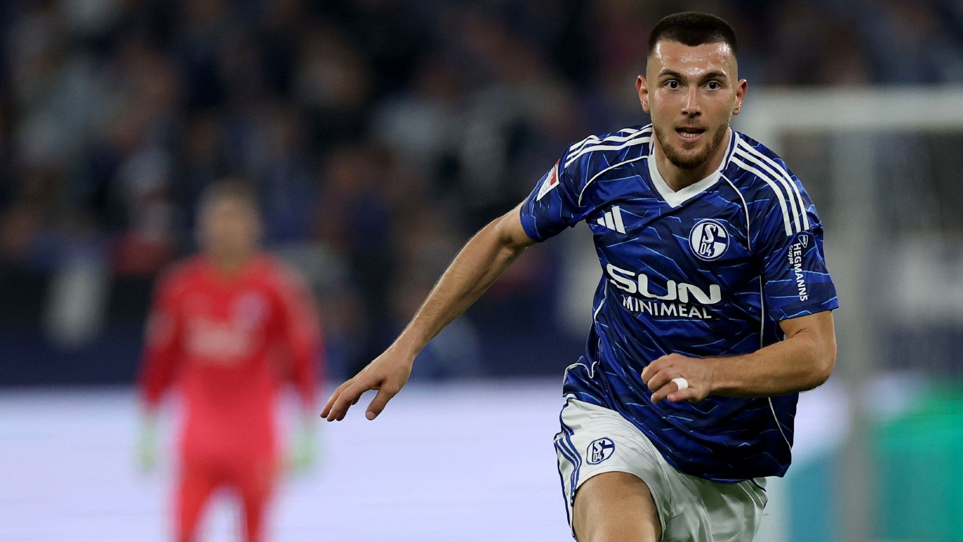 Hasan Kurucay of Schalke runs with the ball