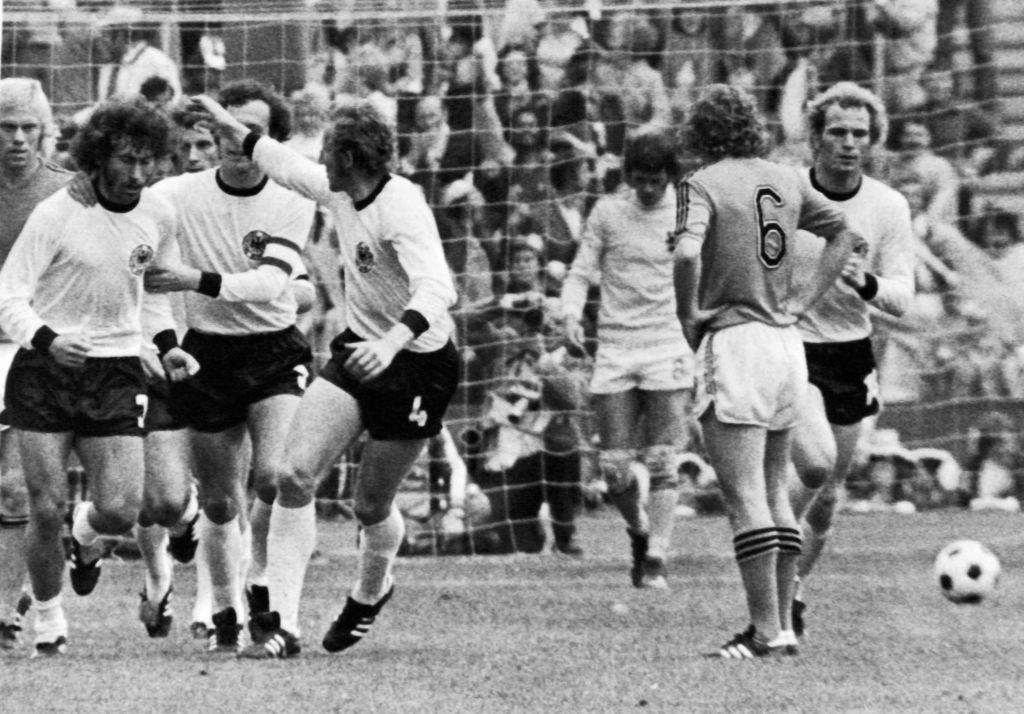 Hans-Georg Schwarzenbeck along with Franz Beckenbauer and Paul Breitner