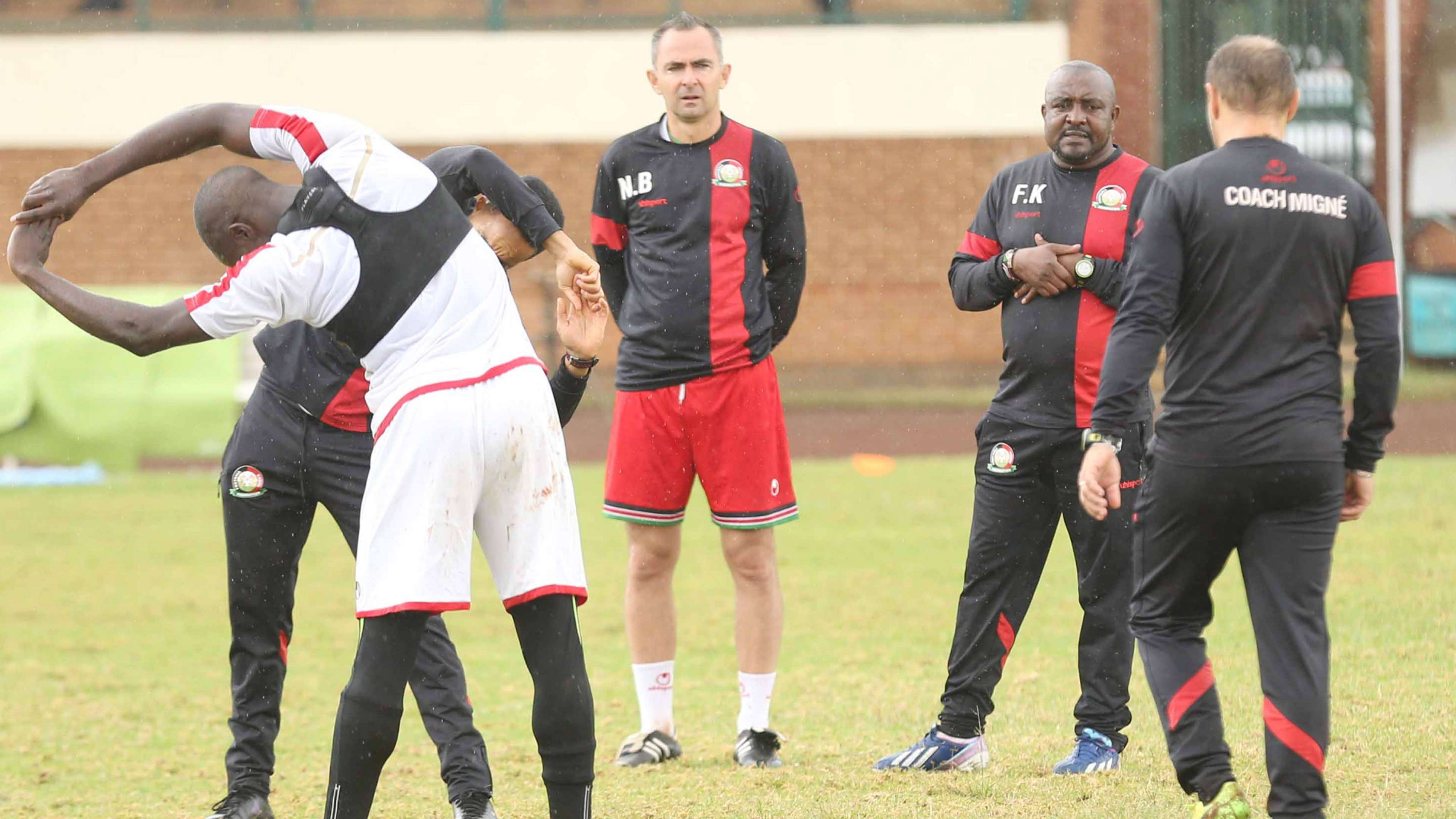 Harambee Stars coach Francis Kimanzi and Sebastien Migne.