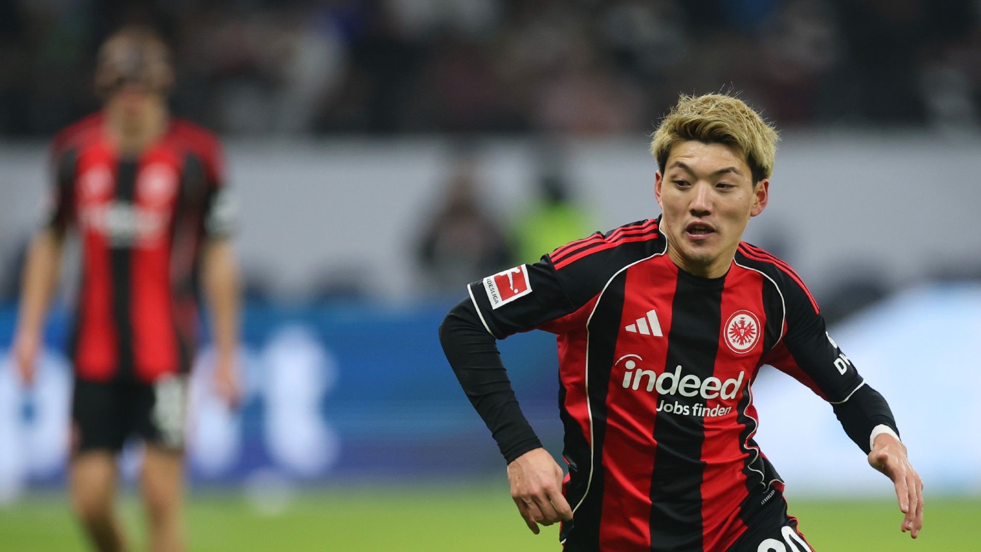 Ritsu Doan of Eintracht Frankfurt controls the ball