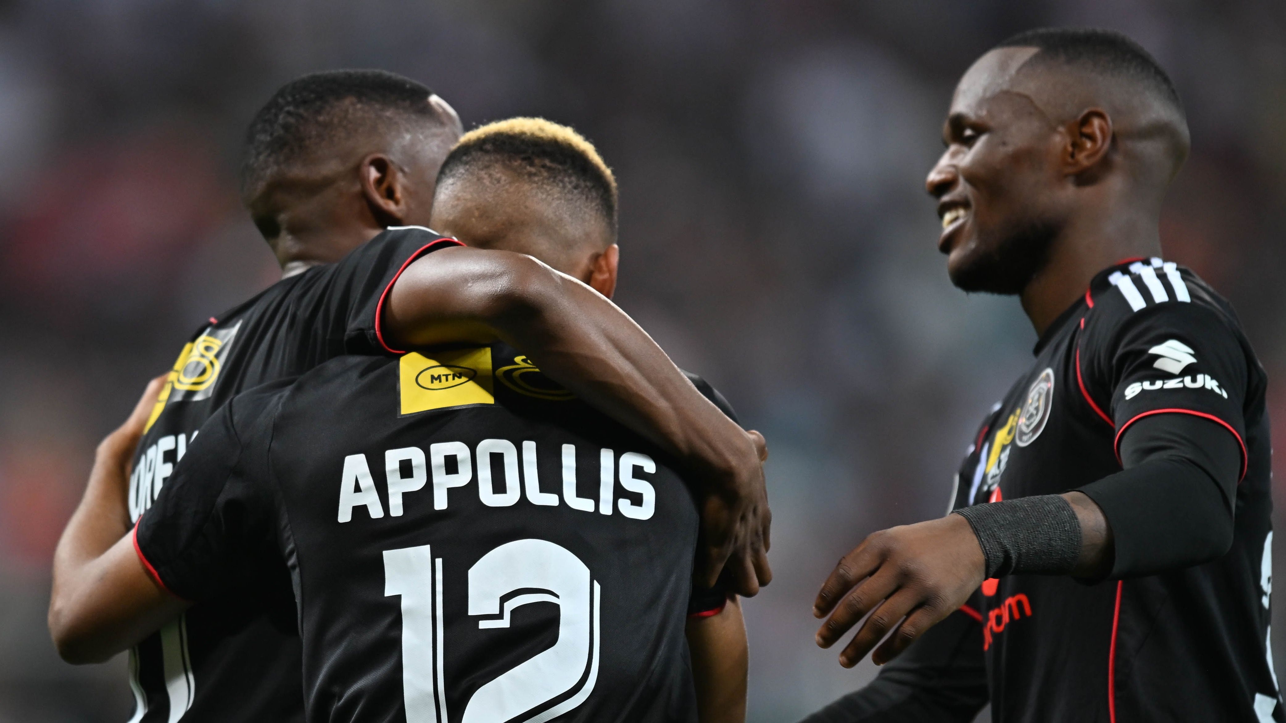 Oswin Appollis of Orlando Pirates celebrates Tshepang Moremi's goal