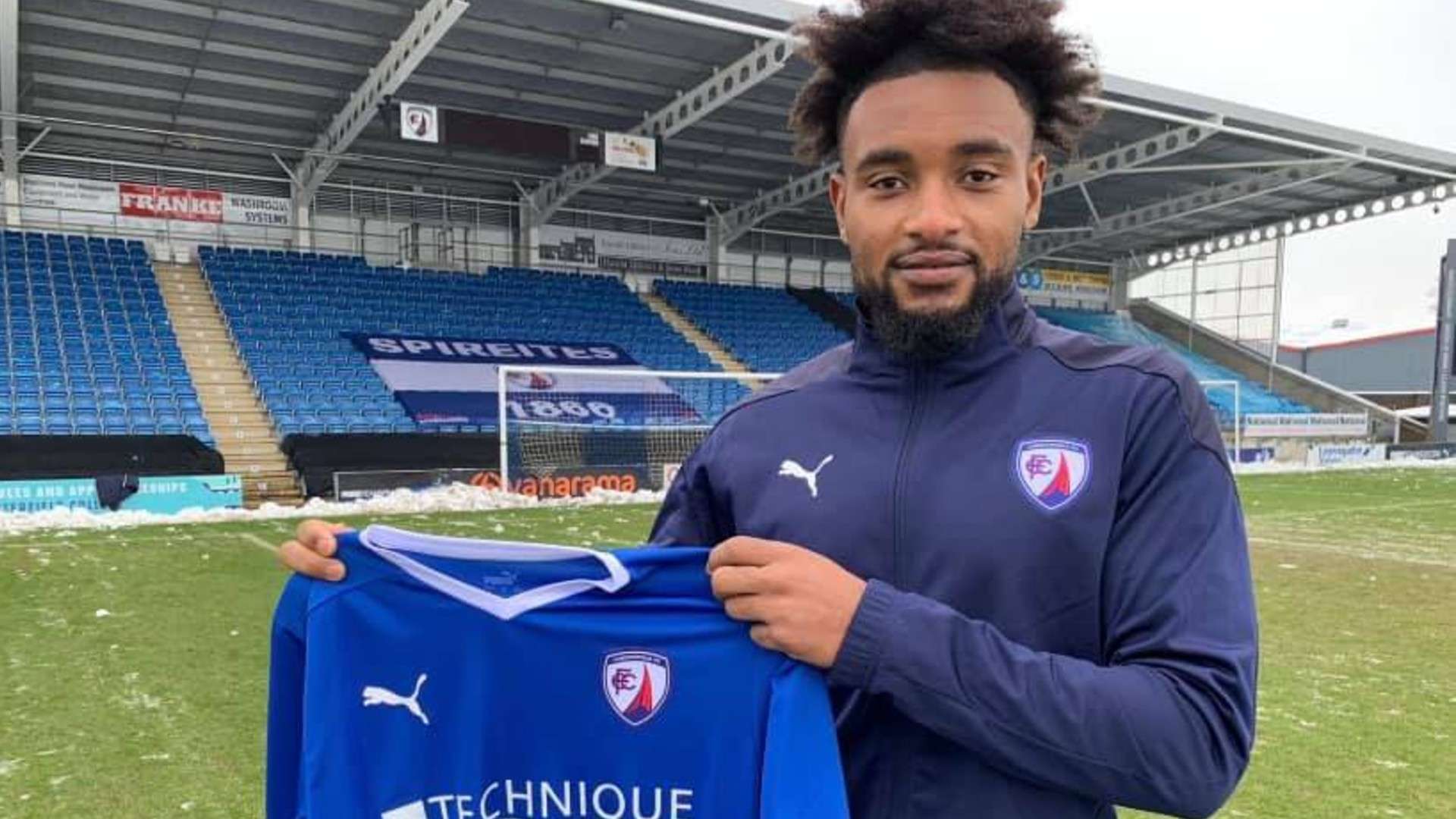 Adi Yussuf of Tanzania signs for Chesterfield FC.